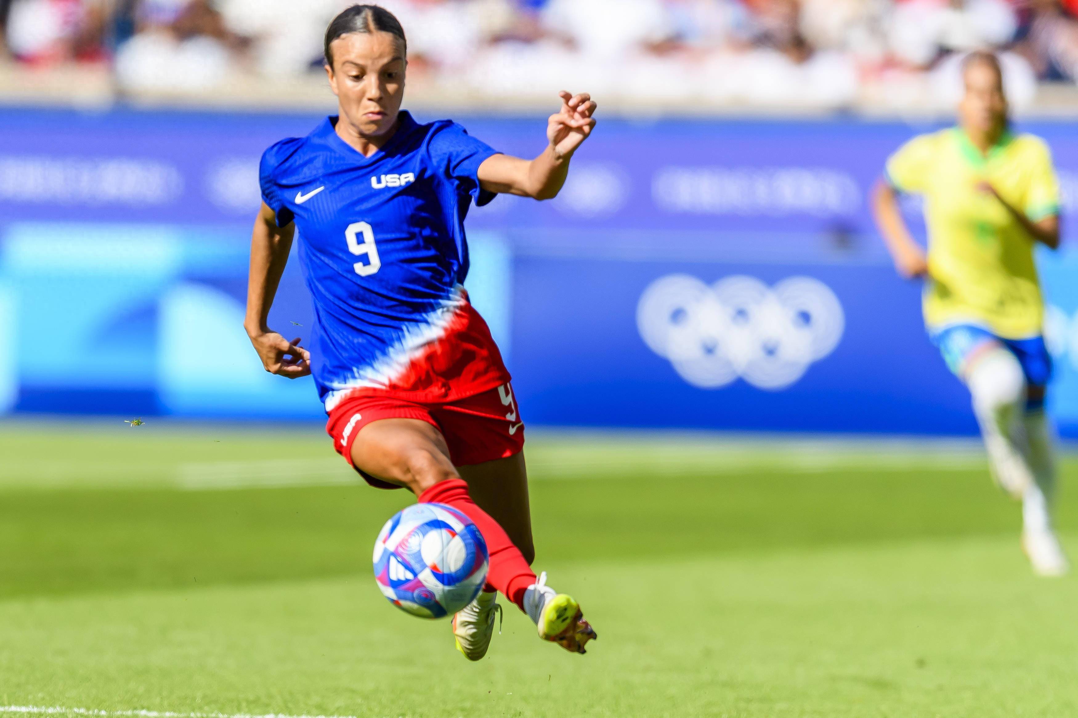 爱游戏-女足国家队的壮举轰动世界,震撼人心